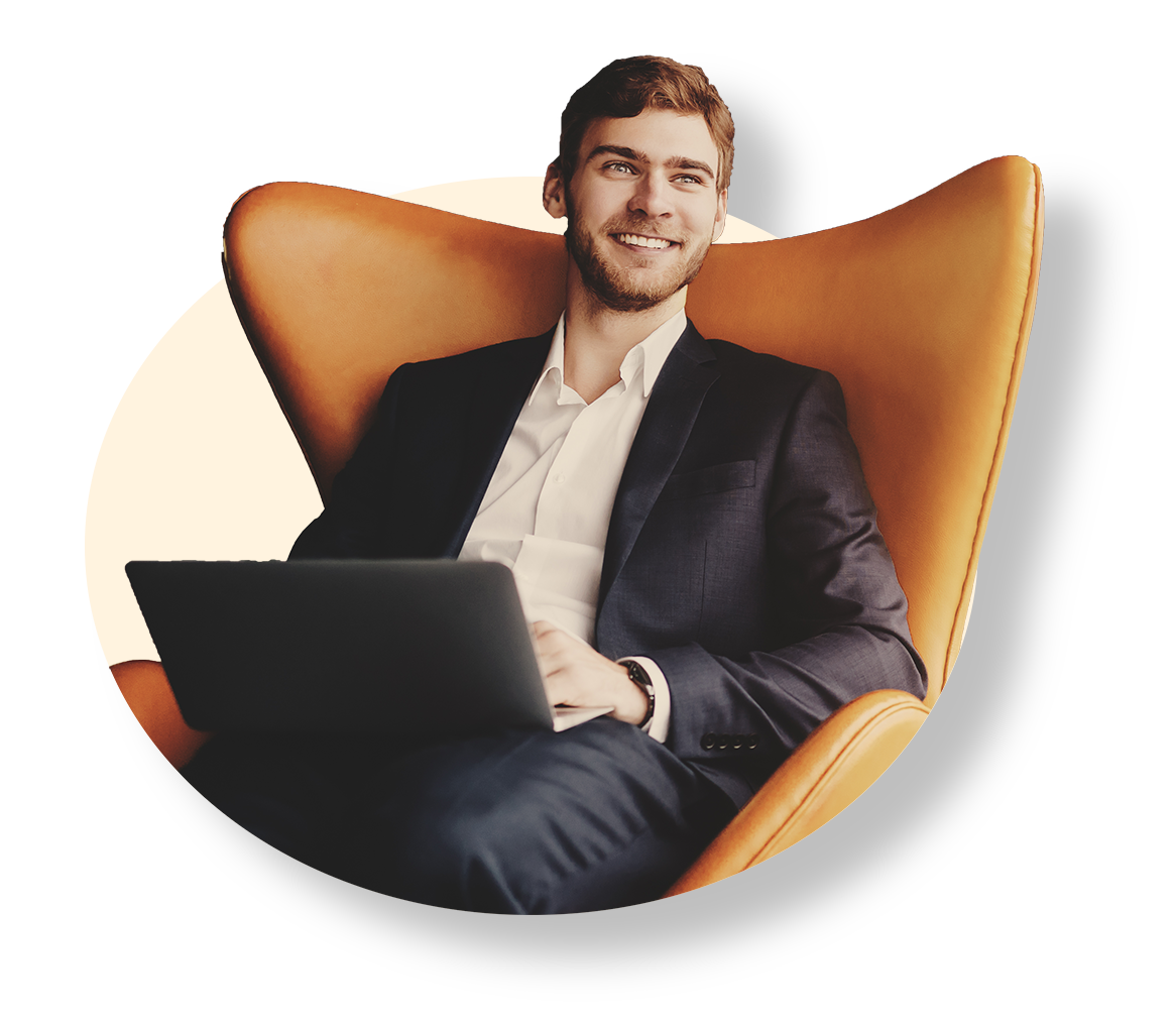 Businessman sitting on a chair with  a laptop