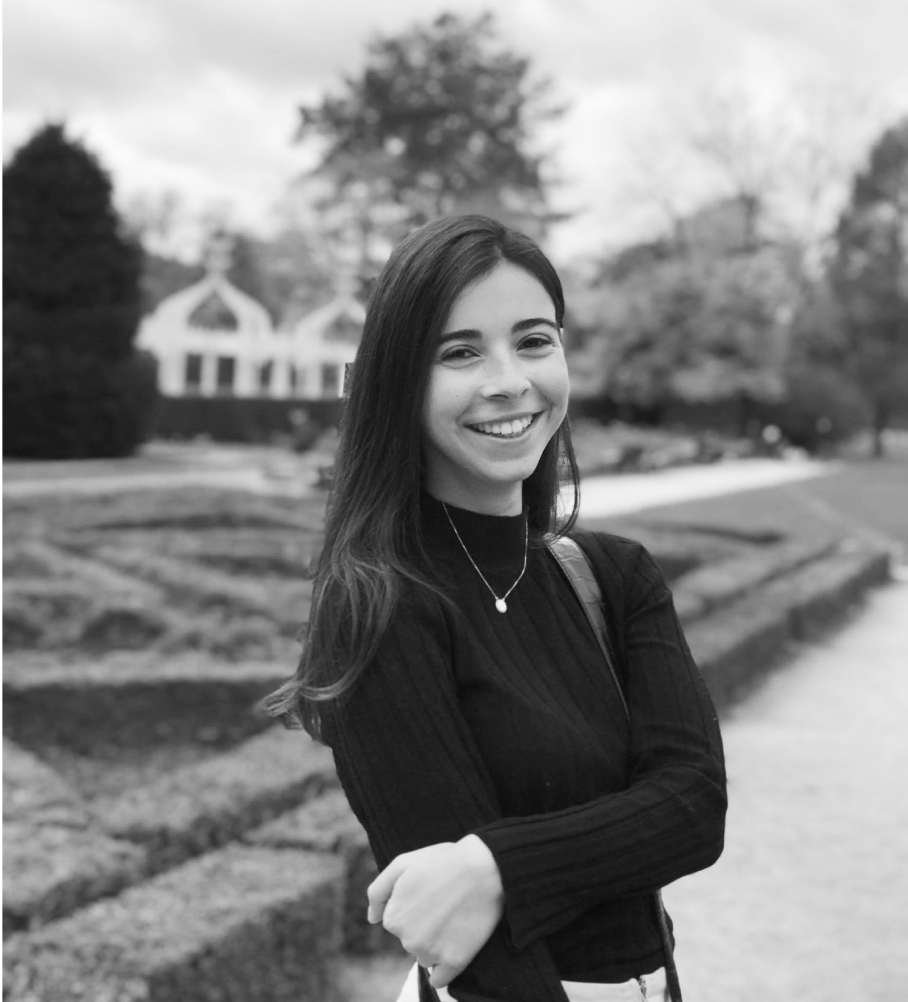 Photo of myself in a park smiling 