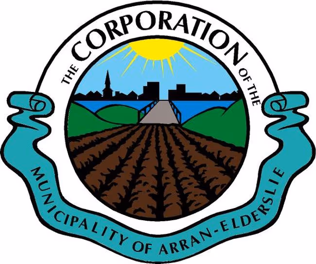 Logo showing plowed farmland with green hills, a water body, city skyline, sun, and the text 'The Corporation of the Municipality of Arran-Elderslie'.