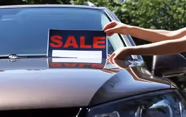 Private car for sale in Canberra with a SALE sign displayed on the windscreen, showing one way to sell your car in Canberra to get the best price.