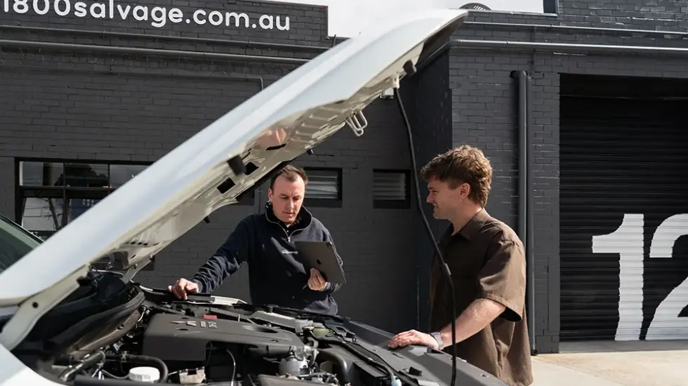 Mechanic providing inspection before old car removal in Adelaide, helping owners get rid of old cars with a hassle-free process.
