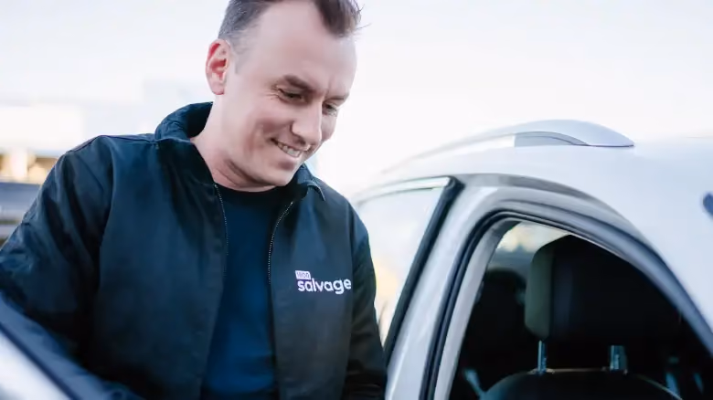 1800 Salvage team member in Darwin providing a scrap car evaluation and instant quote for cash for cars and free car removal.