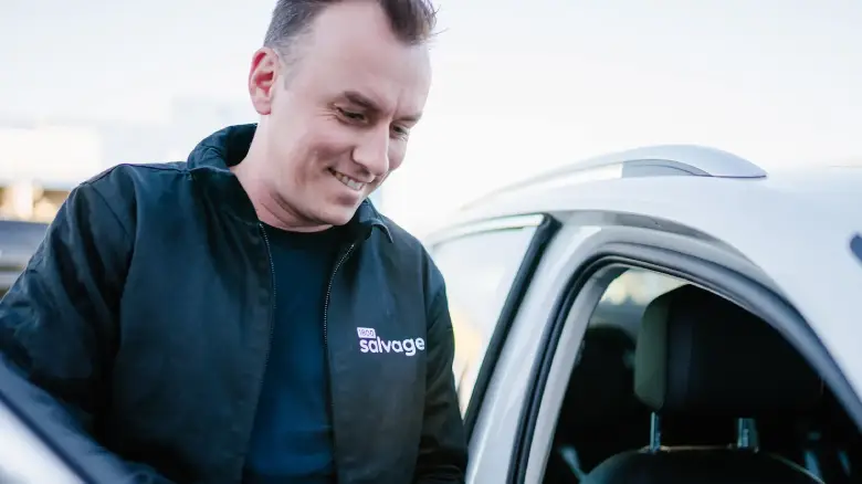 1800 Salvage team member in Darwin providing a scrap car evaluation and instant quote for cash for cars and free car removal.