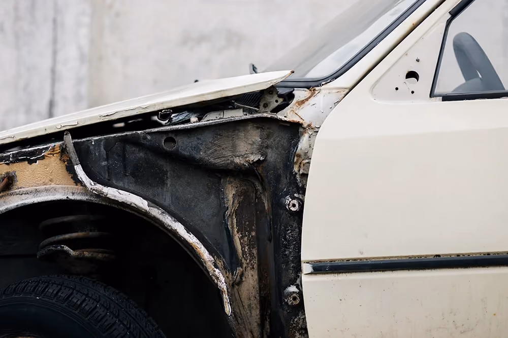 Damaged white car