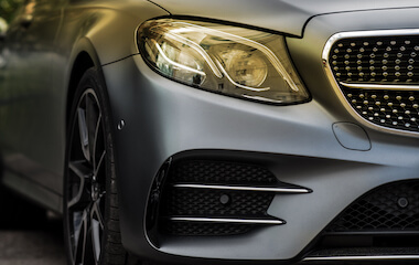Close up of a matte grey car