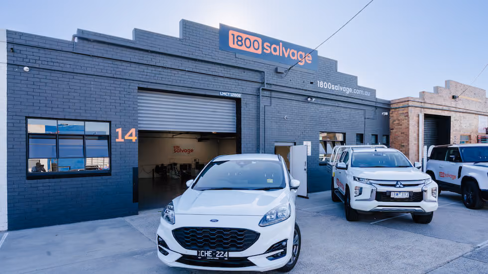 1800 Salvage store exterior with three Salvage vehicles out the front