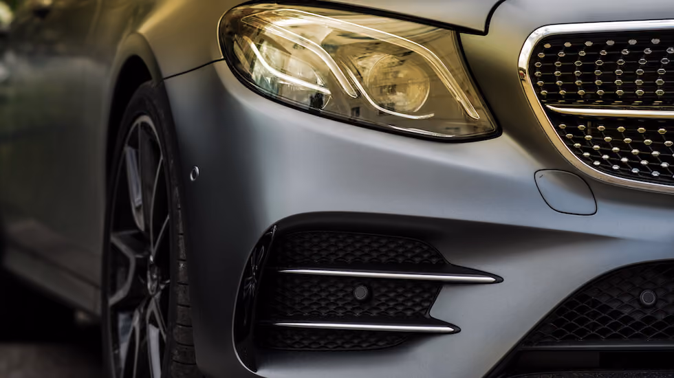 Close up of a matte grey car