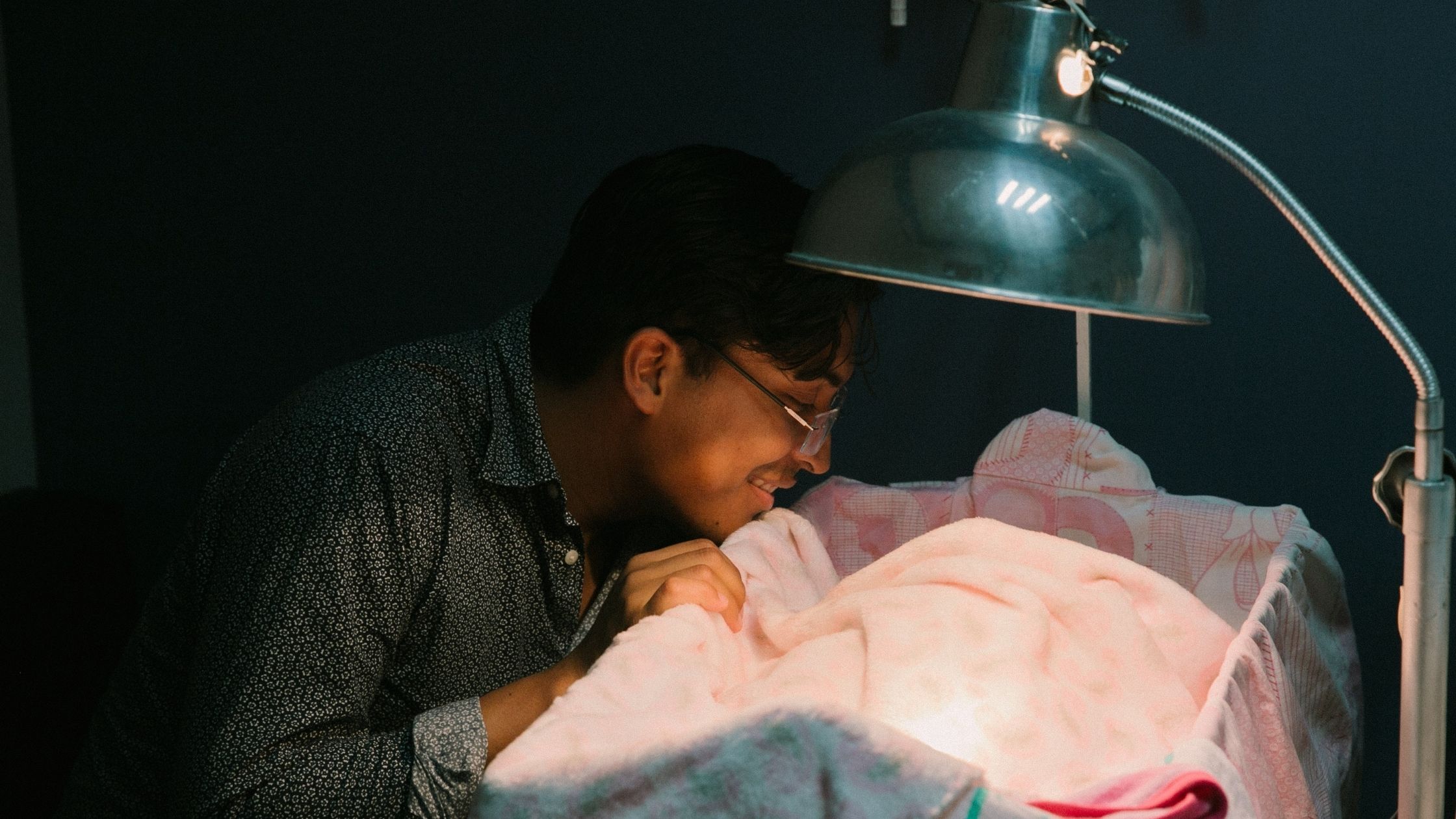 A Dad Peeks Into His Baby's Crib