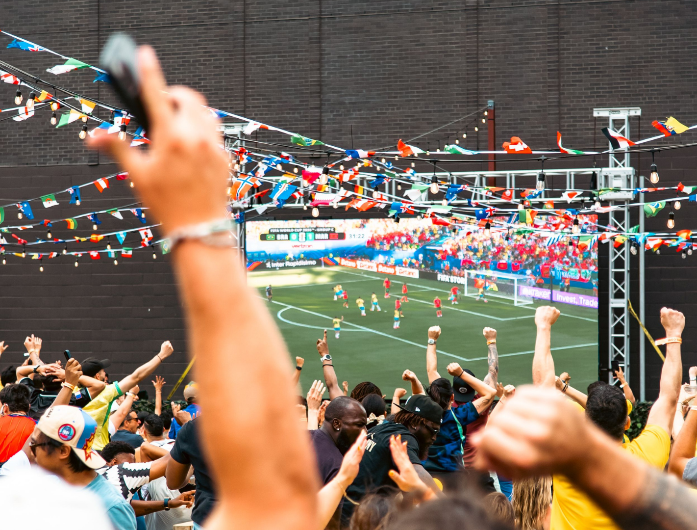 Friends having a watch party for a World Cup game.