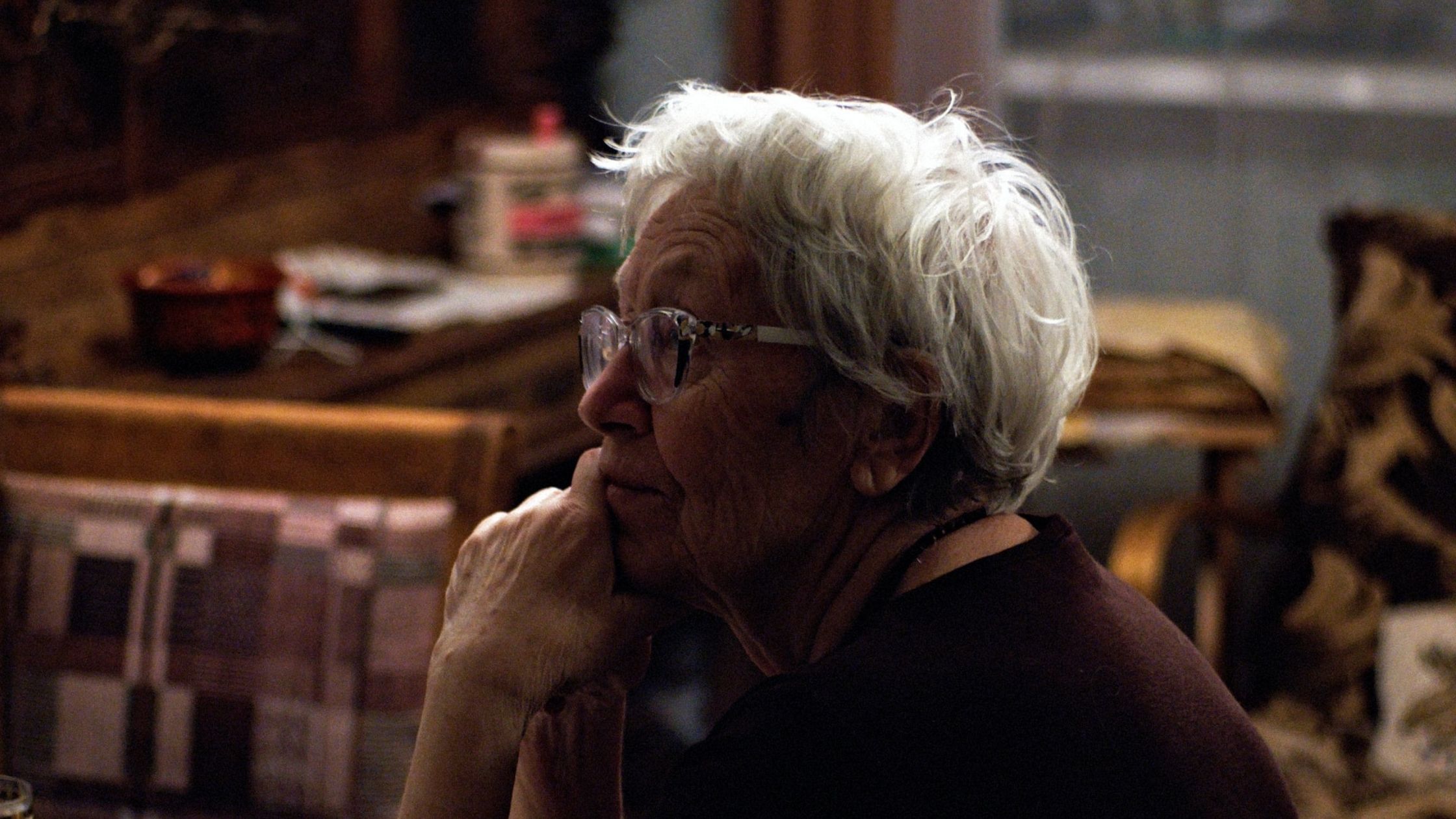 A retired woman in a studio