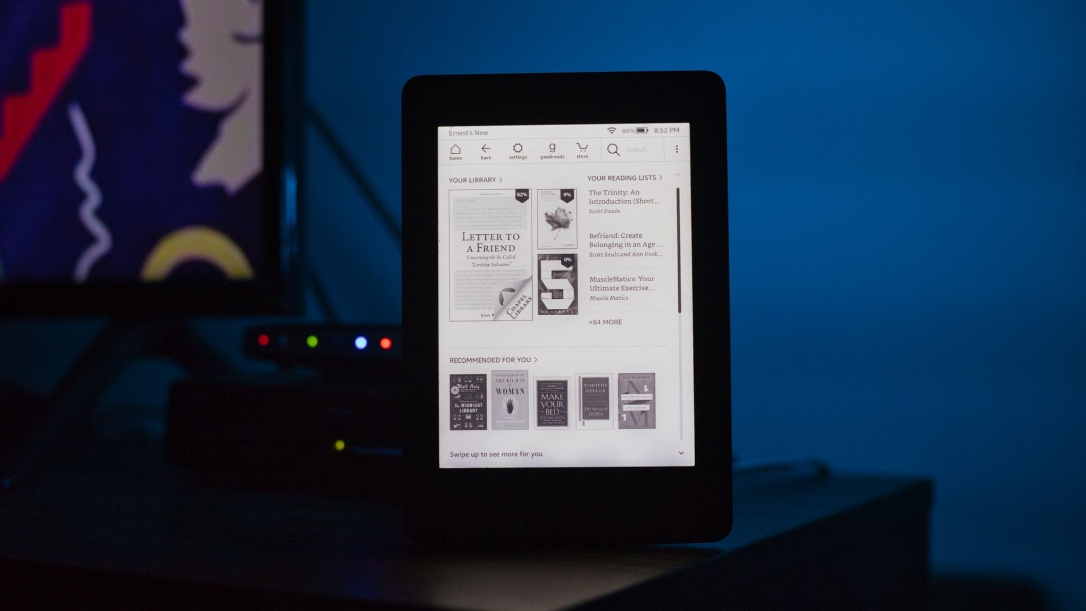 A kindle on a blue backround