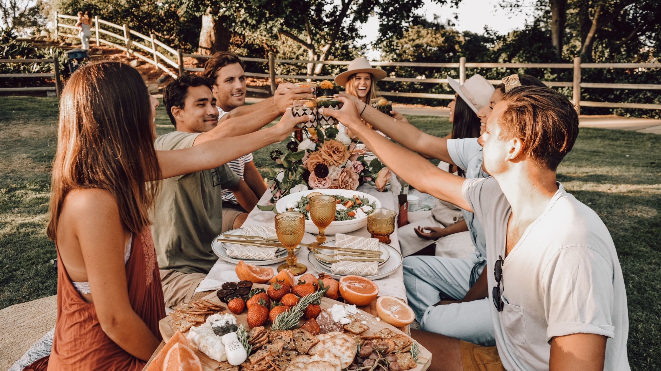 A Group Of Friends, In A Field.