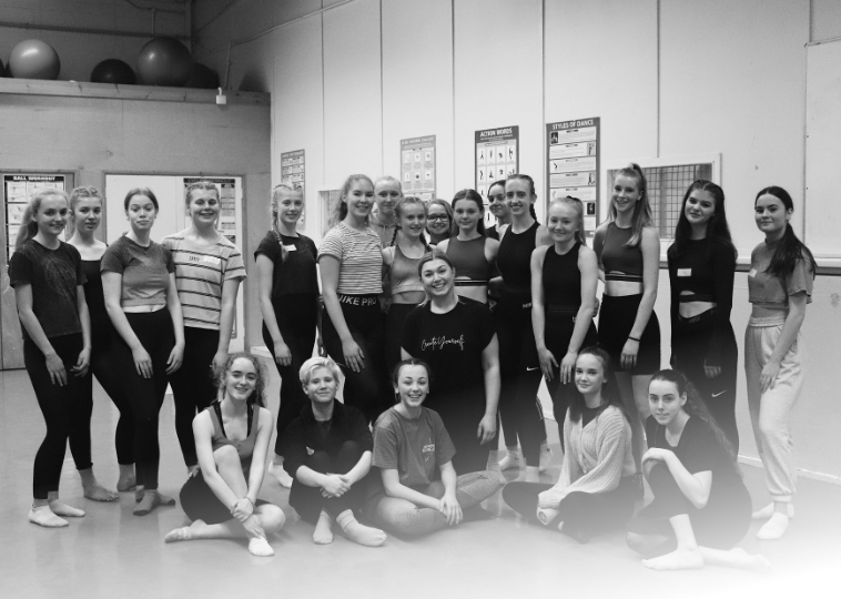 Dancers pose for a group photo during an AP Choreography Workshop
