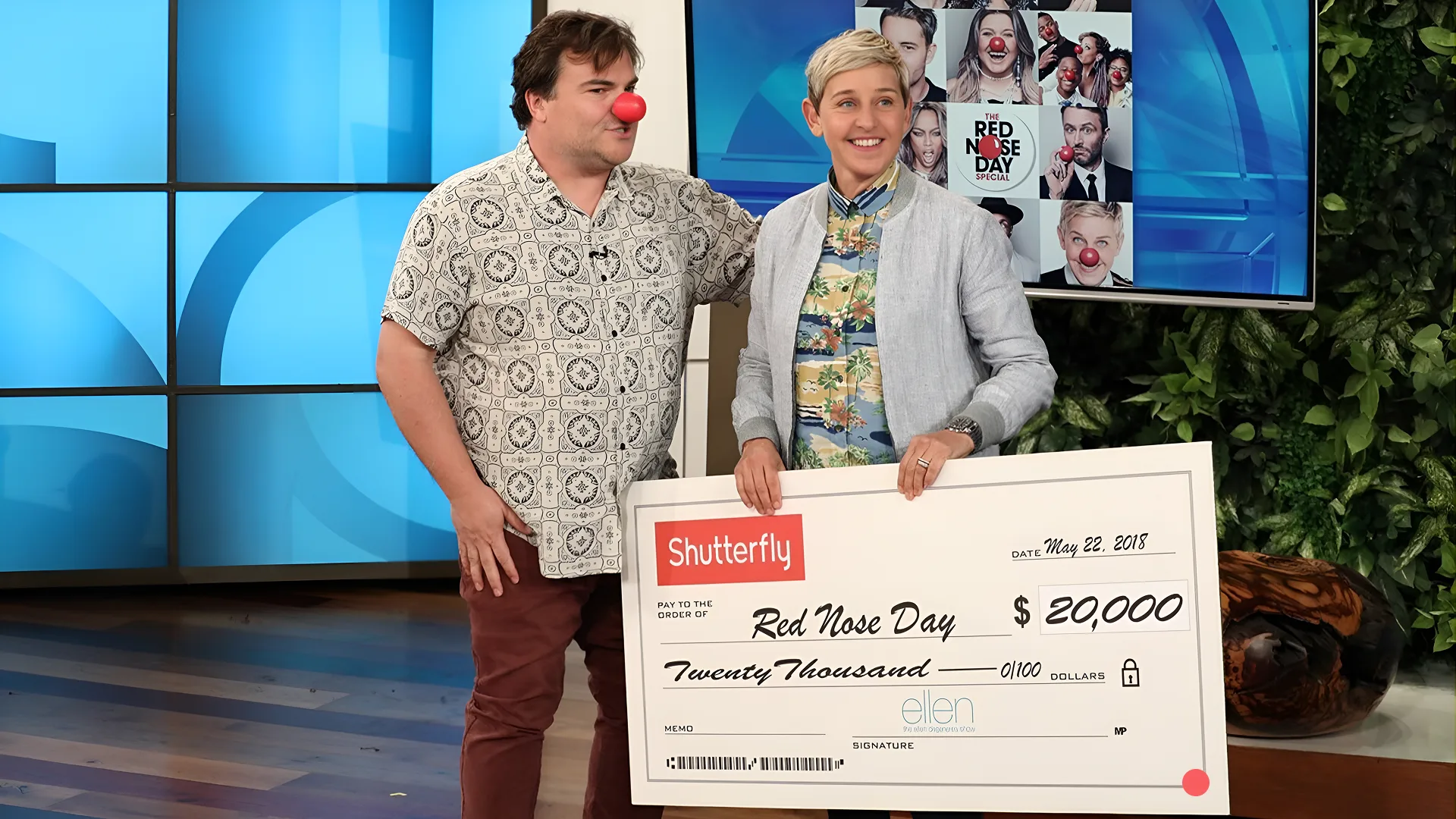 Jack Black and Ellen DeGeneres receive a donation from Shutterfly