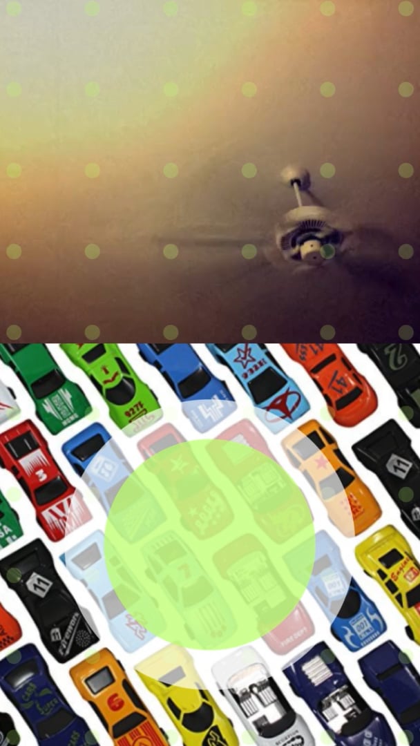 A ceiling fan above and a grid of colorful toy cars below, overlaid with dots and a green circle.