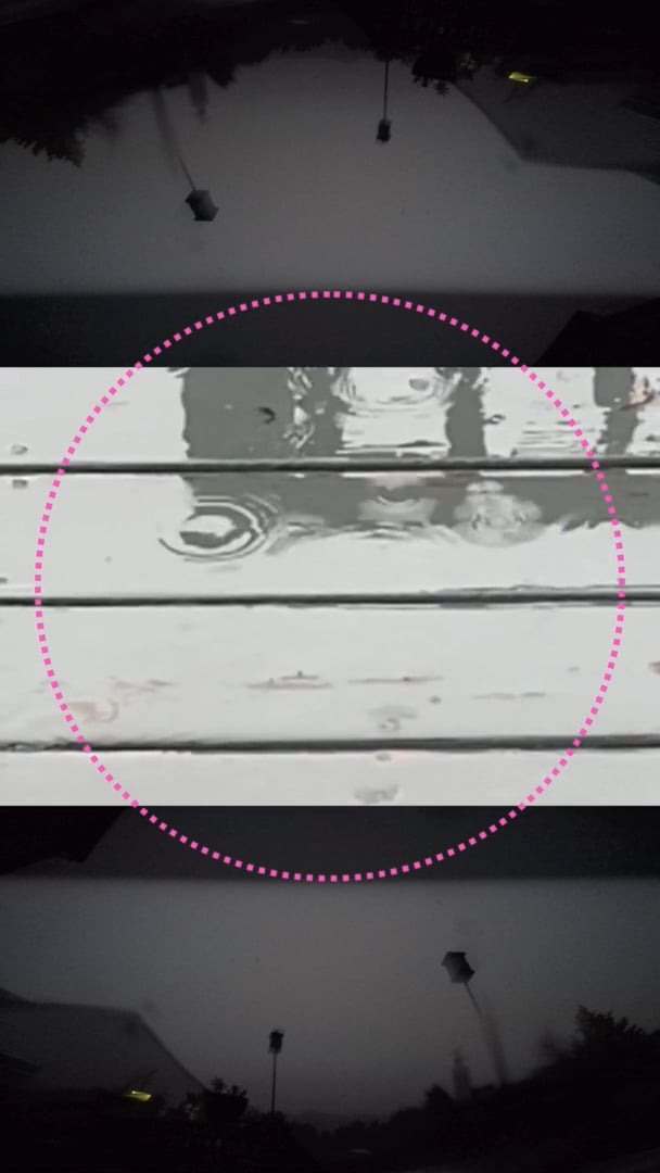 Rain ripples on wooden boards circled in pink, framed by a dark porch scene above and below.