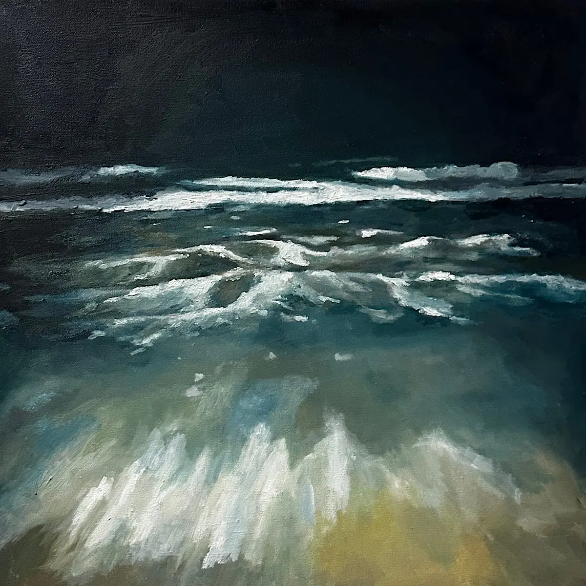 Oil painting of Dark, atmospheric seascape painting showing white-capped waves rolling toward a sandy shoreline beneath a deep blue-black sky.
