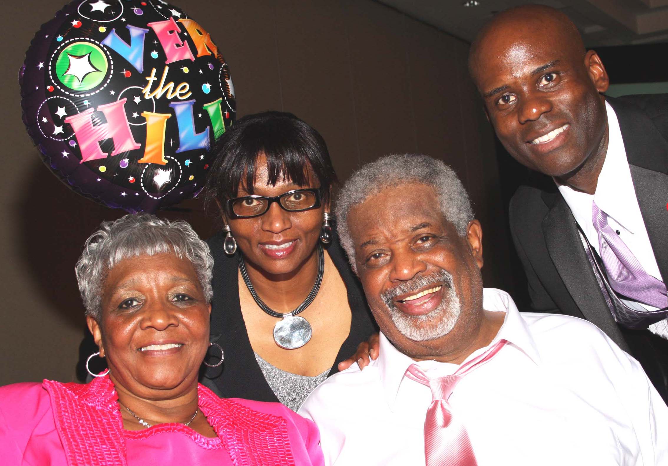 Dr Daddio and his wife Pat with Lenora Alexander of Denver Weekly News and brother jeff of brother jeff’s Cultural Center at Daddio‘s Over-the-Hill birthday party.