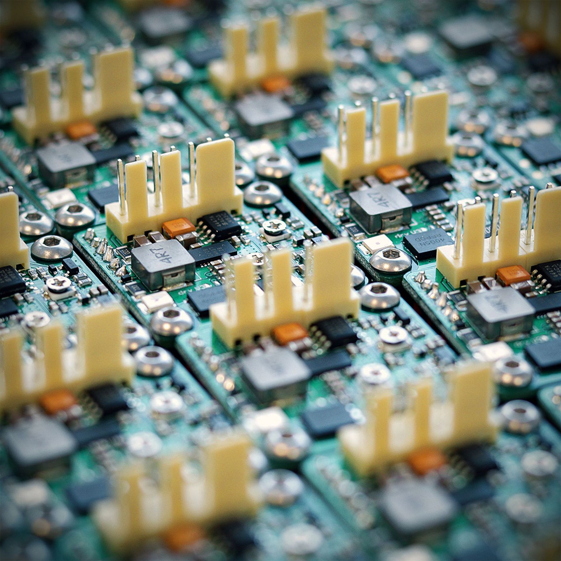 Detailed image of electronic microprocessor boards with components in focus. Photo by Opt Lasers from Poland on Pexels.com