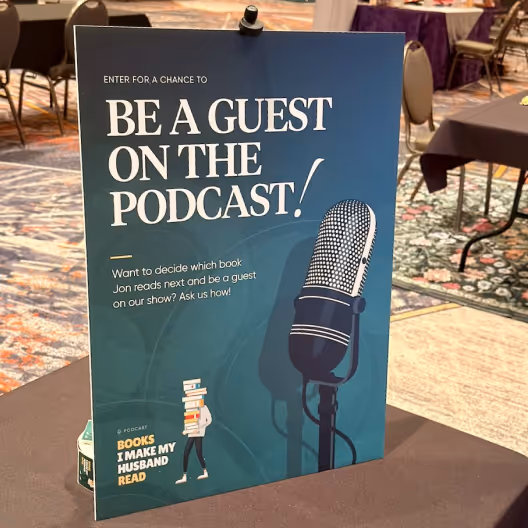 Sign inviting to enter for a chance to be a guest on a podcast about books.