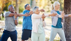 Seniors exercising outdoors
