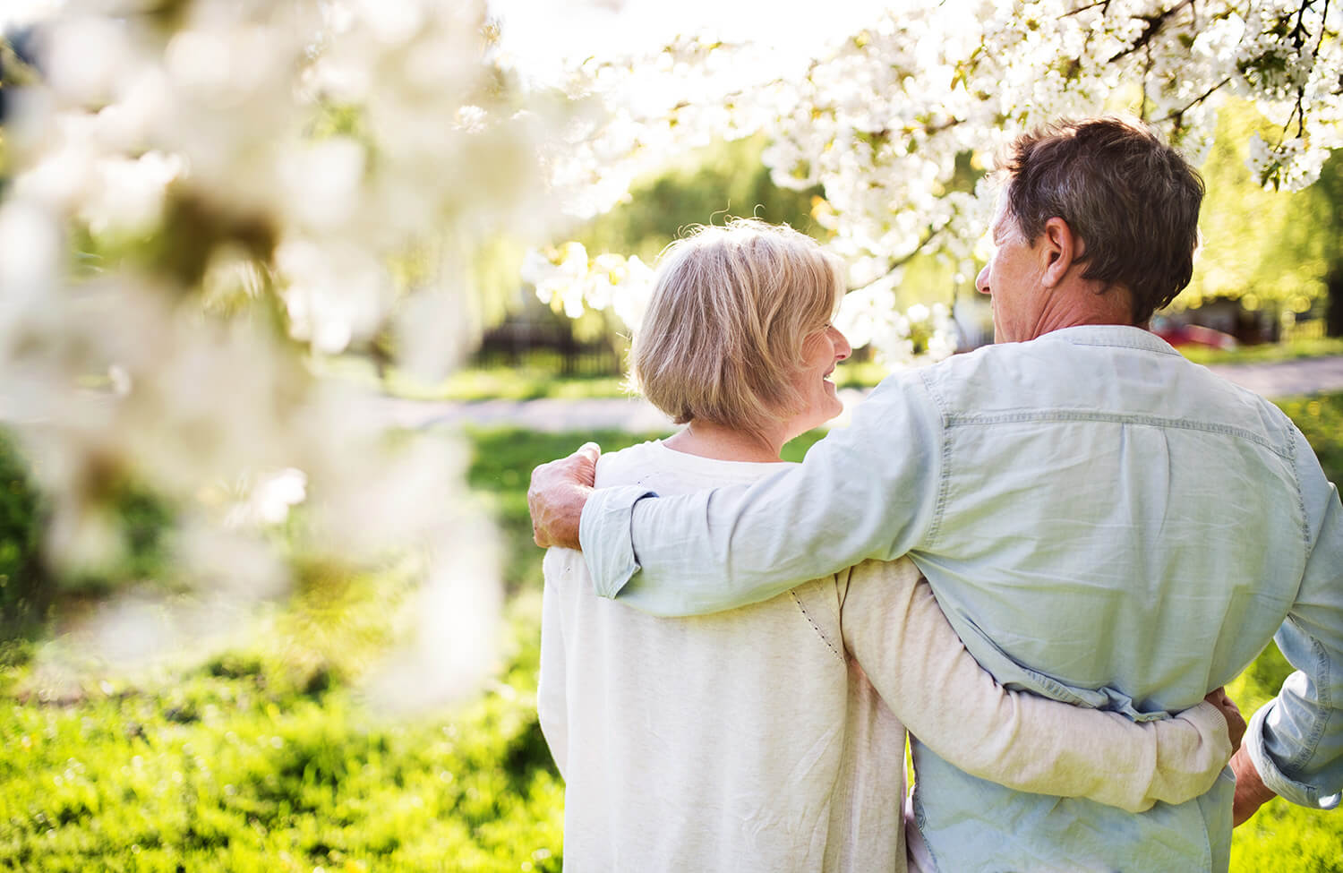 Beautiful senior couple in love outside in spring nature.