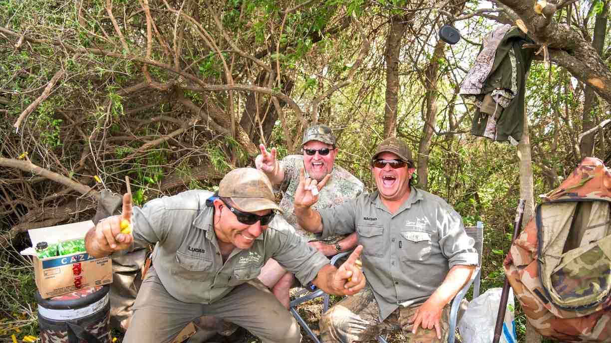 Dove hunting guests celebrating at the lodge