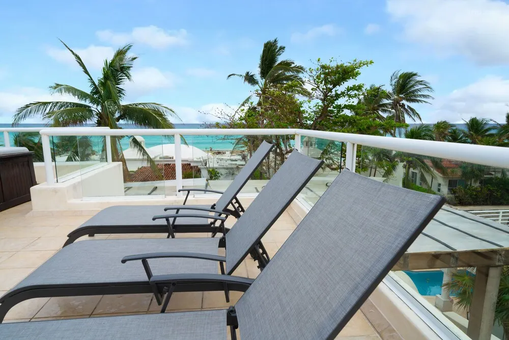 villa terrace with ocean view and loungers