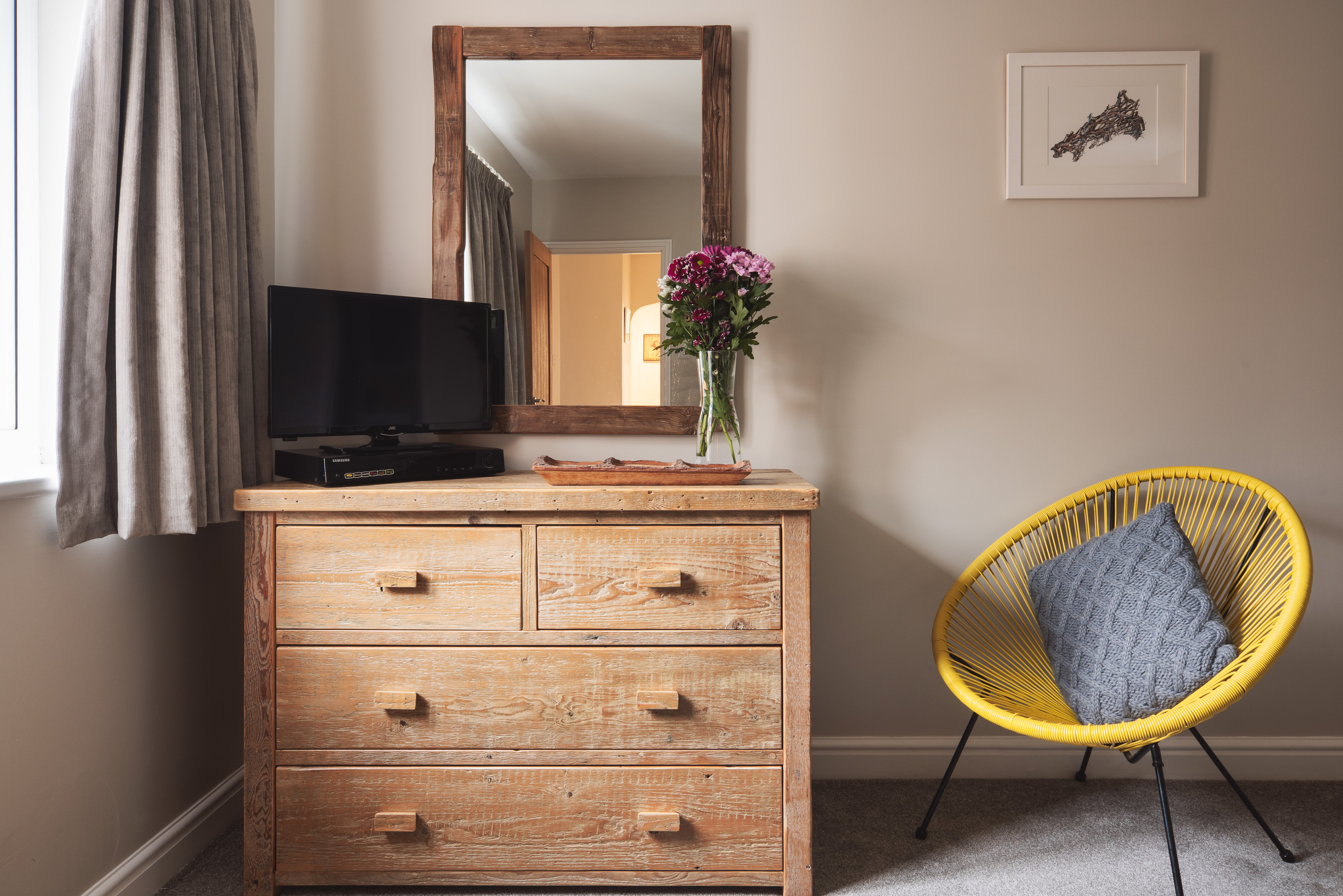 Wooden dressing table made from sustainably sourced wood, part of the collection throughout Gwelmor holiday home