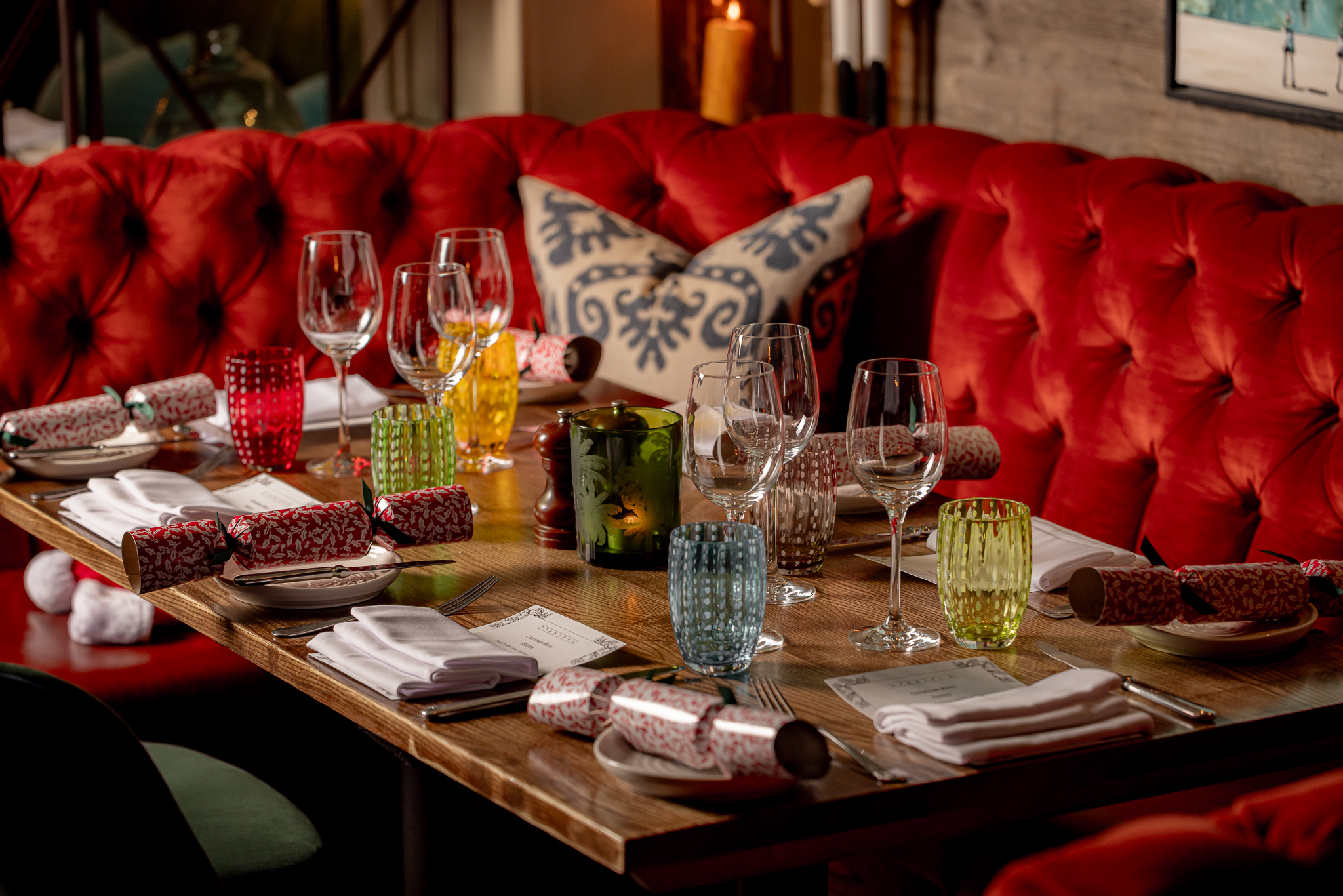 A fully laid -up table in The Private Room at Stanley's Chelsea with a floral illustrated border