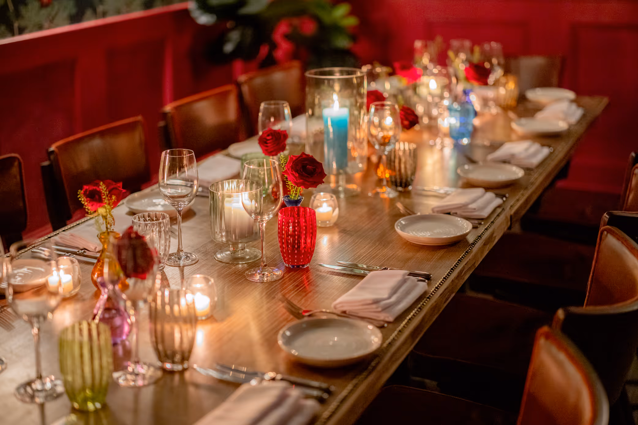 A fully laid -up table in The Private Room at Stanley's Chelsea with a floral illustrated border