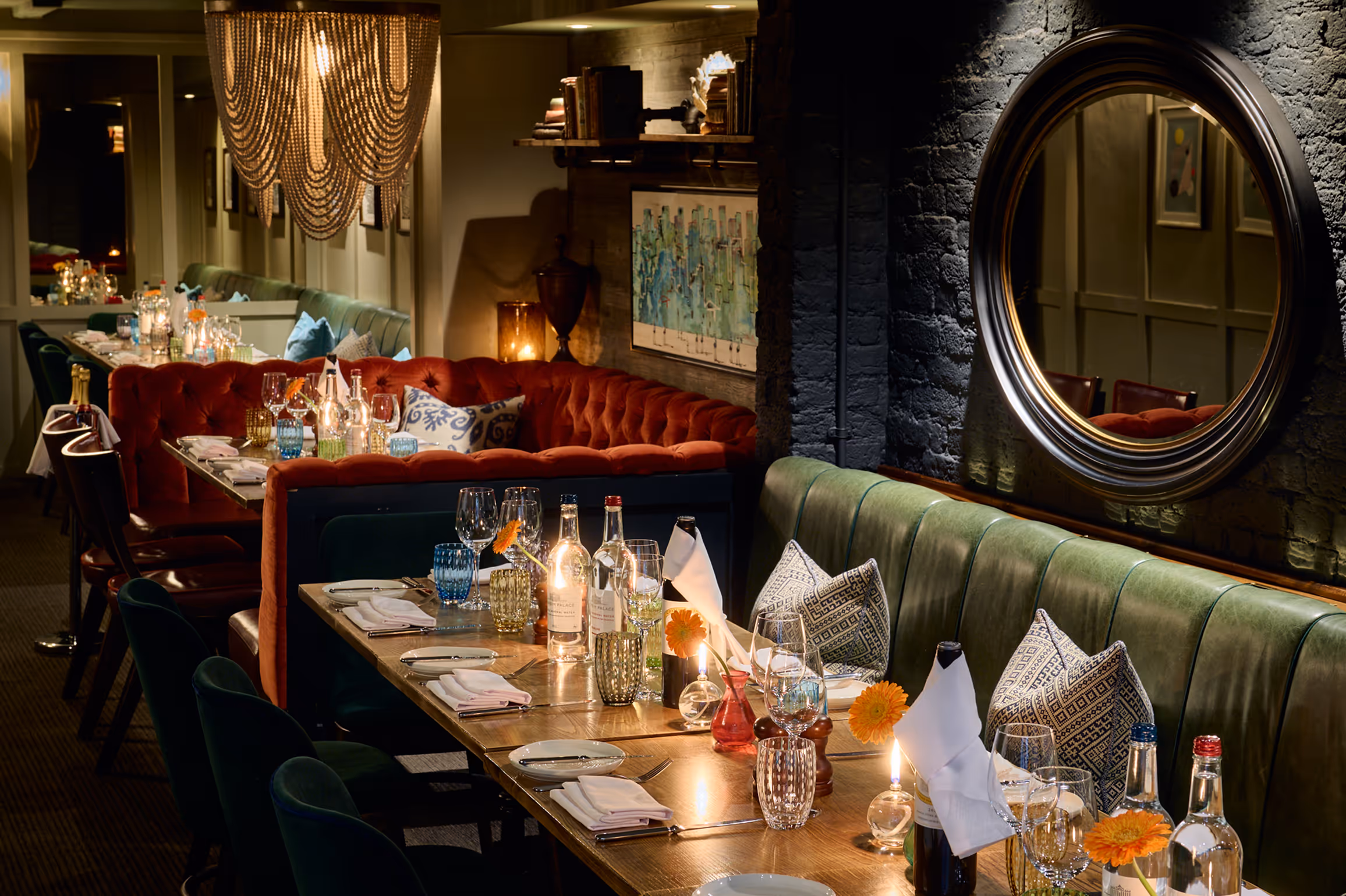 A fully laid -up table in The Private Room at Stanley's Chelsea with a floral illustrated border