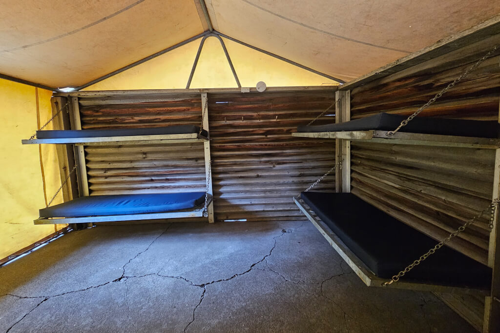 four bunk beds inside a cheap camping cabin in Grand Teton