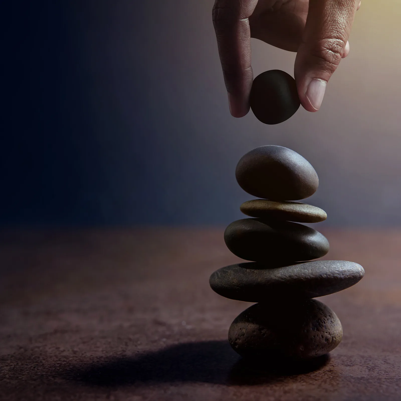 Stones being stacked on each other