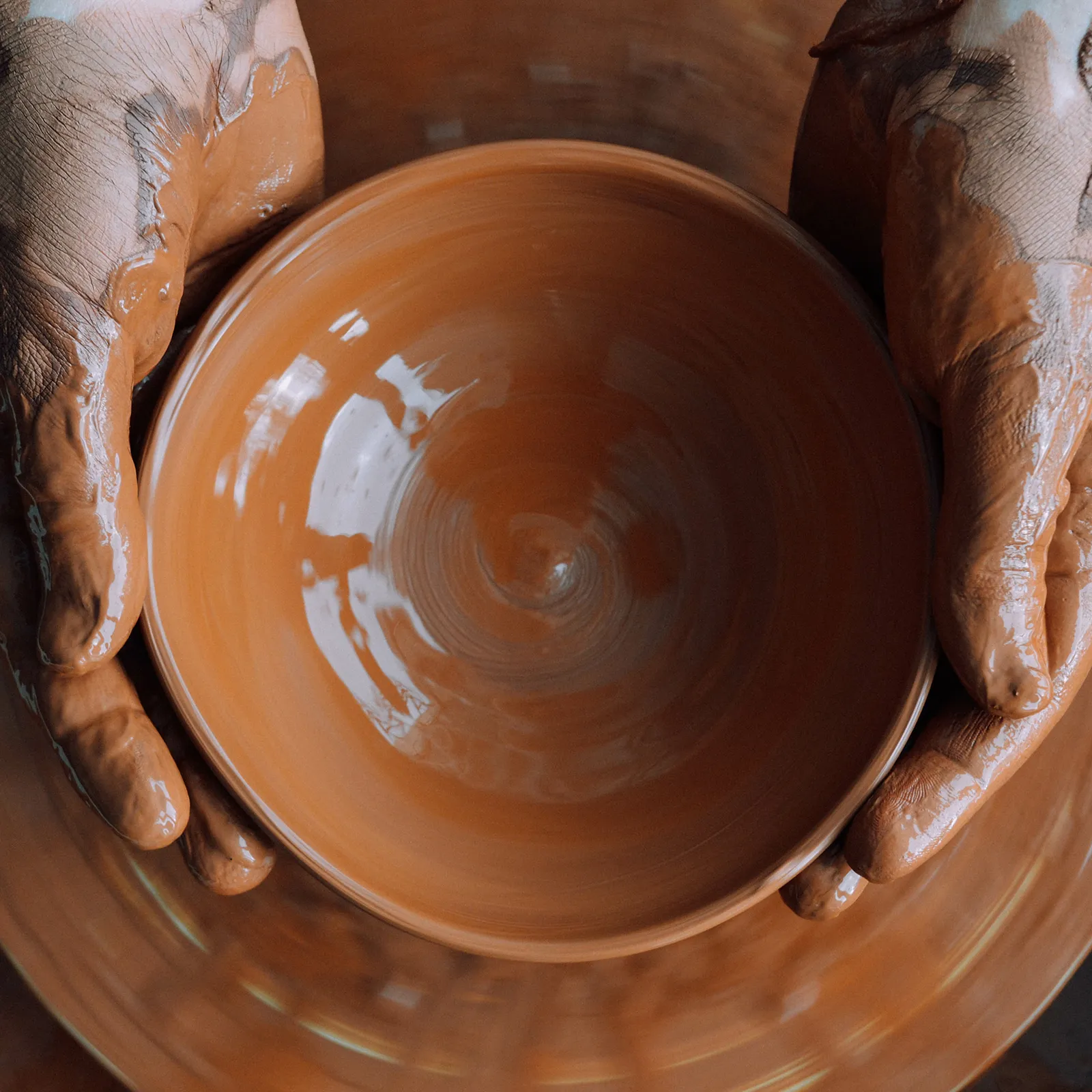 A picture of a clay being molded