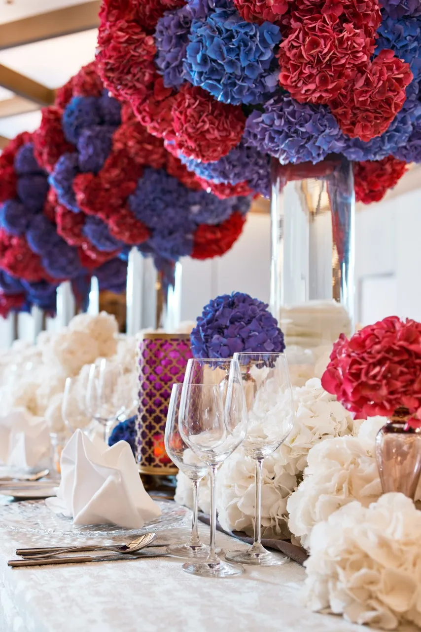 Flowers and glass cups on a table