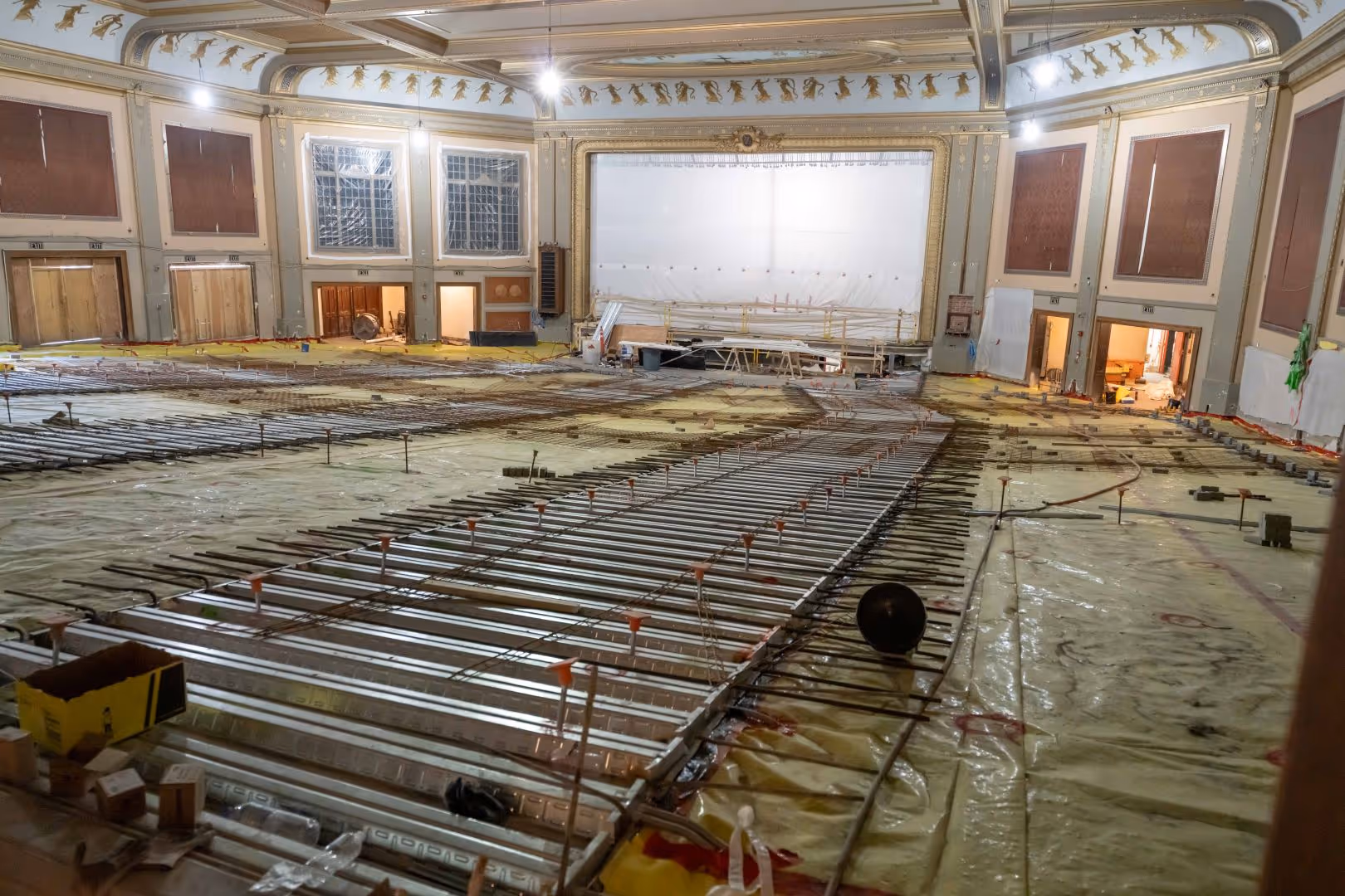 The Zeiterion theater interior, before pouring the concrete floor. Yellow plastic covers the floor. 