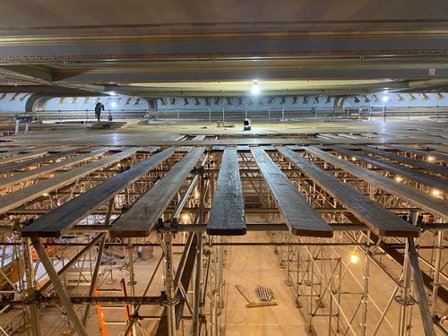 The top of the scaffolding in the Zeiterion Theater. Part of the floor of the theater is visible. Most of the image is the top of the scaffolding and ten foot distance between it and the floor.