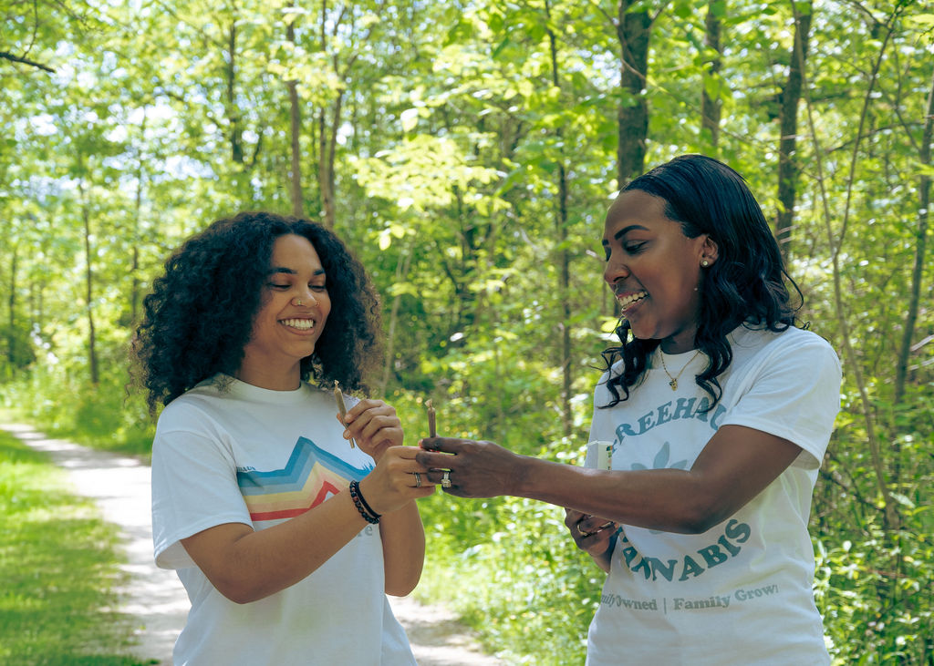 Two friends on a wooded trail