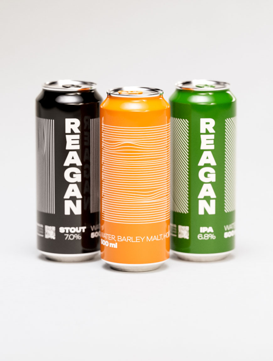Professional craft beer packaging design featuring Reagan brand's orange ale as the central focal point within a three-can brand system. The design showcases sophisticated typographic hierarchy with vertical brand name treatment in bold sans-serif letterforms against dynamic horizontal line patterns. Orange variant displays 5.9% ABV specification with "WAITER, BARLEY MALT HOP" descriptive copy, demonstrating strategic packaging copywriting integration. The tri-color system includes black stout and green IPA variants flanking the hero product, illustrating comprehensive brand architecture and product differentiation through chromatic packaging strategy. Hand-drawn line work creates visual texture and brand recognition through repetitive geometric motifs, while maintaining consistent brand DNA across all SKUs. Photography captures clean studio lighting against neutral background, emphasizing premium craft beer positioning and professional packaging design execution for portfolio presentation.