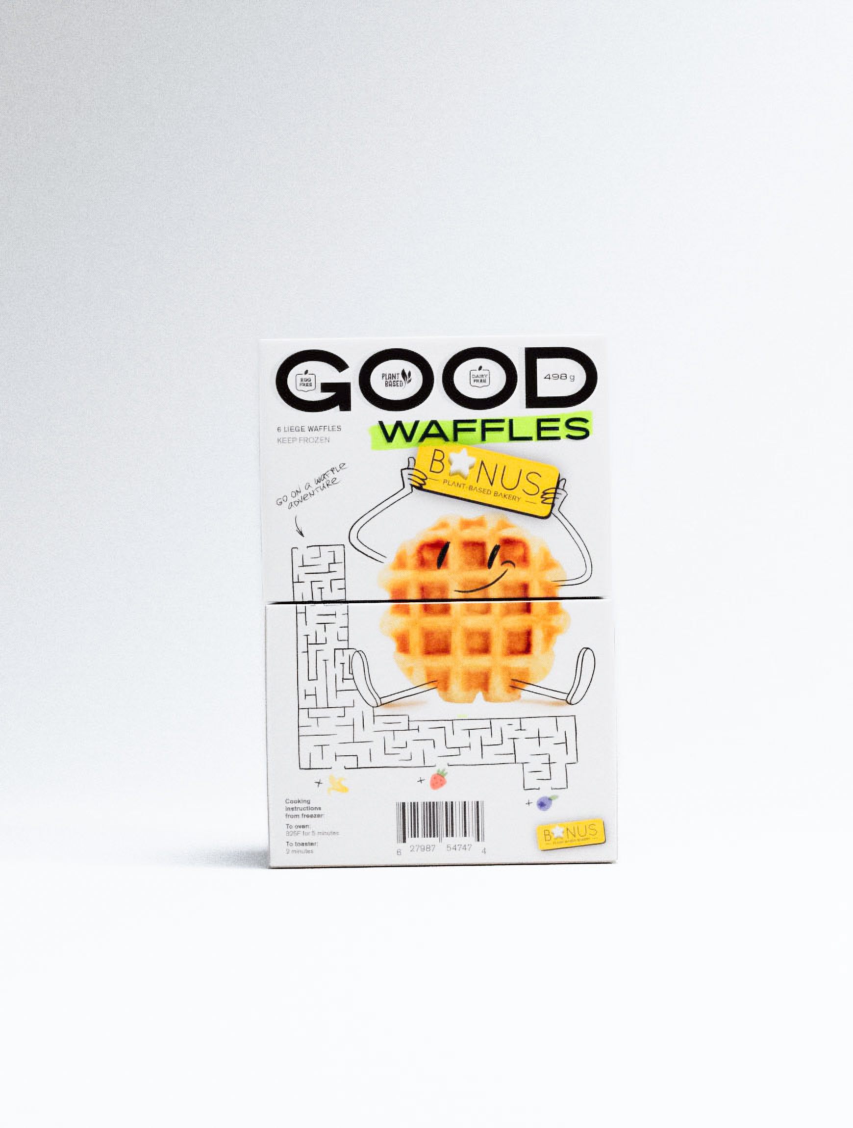Contemporary packaging design studio portfolio featuring GOOD Waffles with distinctive maze puzzle concept and character-based visual storytelling. Professional design agency execution showcasing multi-panel box construction with QR code integration and sustainable packaging messaging. Creative branding solution balancing playful illustration with clear product communication, demonstrating expertise in frozen food packaging design. Typography design combines bold sans-serif branding with handwritten accents for approachable premium positioning in competitive breakfast food market.