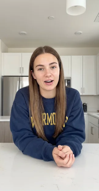 AI actor speaking naturally in a modern kitchen, showcasing realistic facial expressions for UGC-style video content