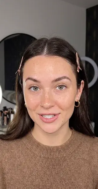 Female AI actor in a makeup-style studio with realistic skin texture and natural lip-sync for UGC and social media ads