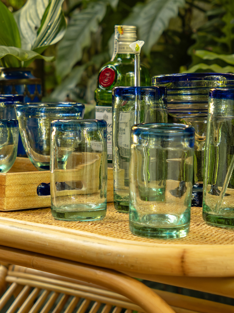 small glass with blue rim