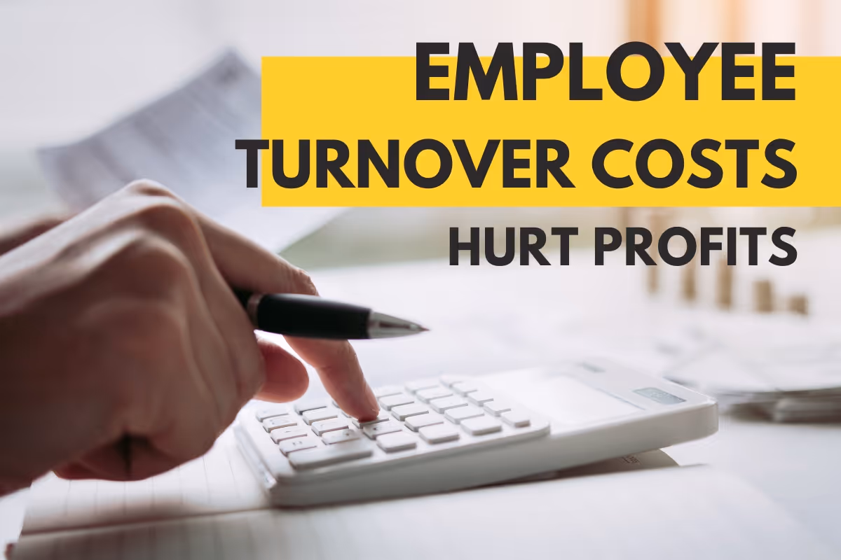 Hands using a calculator - Employee Turnover Costs Hurt Profits