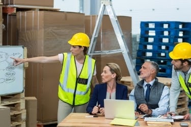 Group of people planning the layout of the warehouse