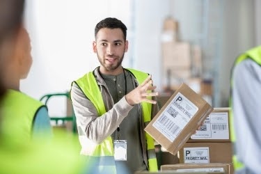 Man with a labeled box