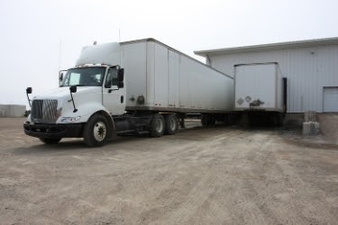 Truck parked in a warehouse facility