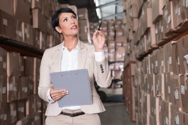 Woman doing manual tracking inventory method