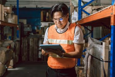 Employee using a digital tablet